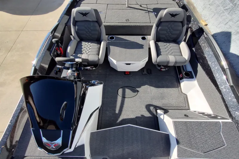 Slide: The Image of 2026 Vexus VXs21 boat interior with dual seats and modern dashboard. - 11