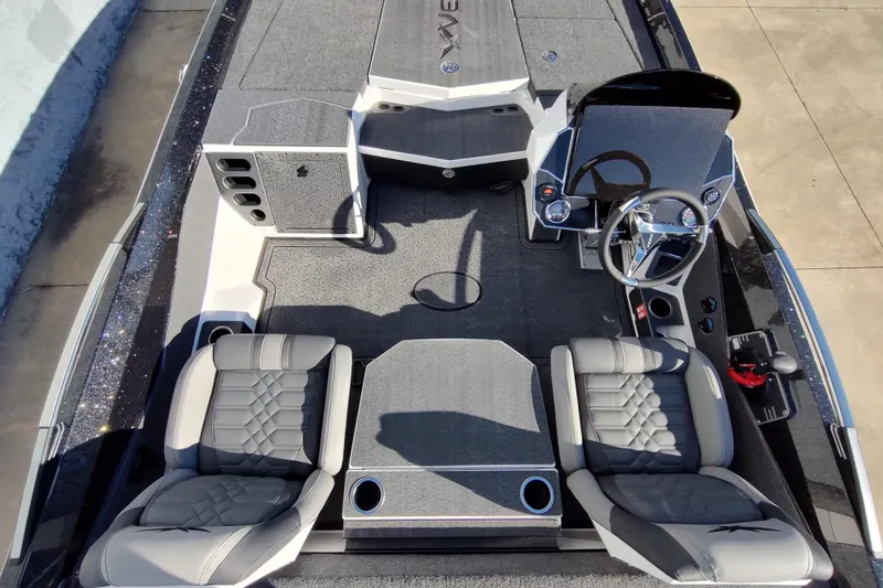 Slide: The Image of 2026 Vexus VXs21 boat interior with modern seating and steering console. - 7