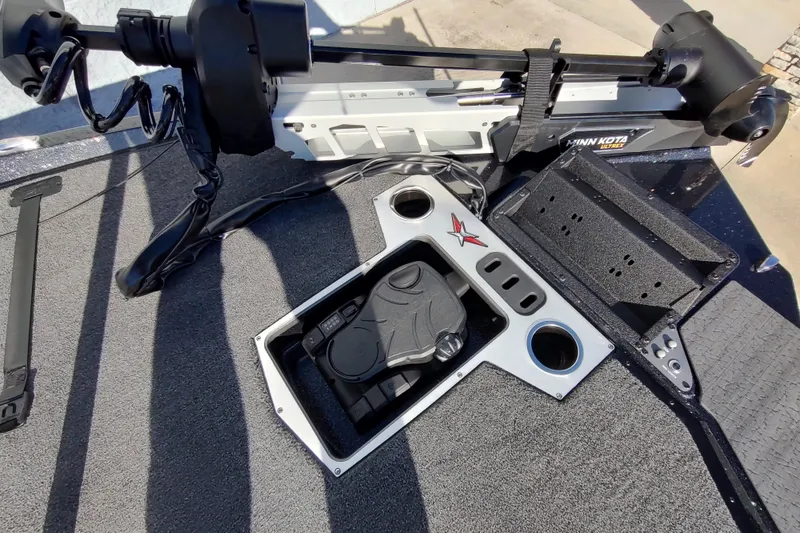 Slide: The Image of 2026 Vexus VXs21 boat deck with Minn Kota trolling motor and control panel. - 9