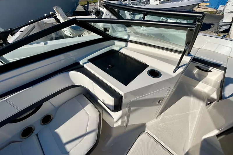 Slide: The Image of 2018 Sea Ray SPX 190 Outboard boat interior with seating and windshield. - 9