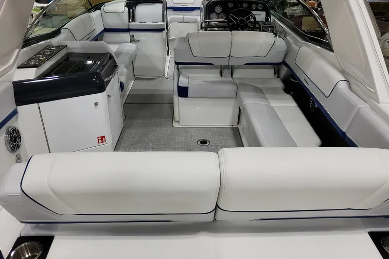 Slide: The Image of Luxurious interior of 2026 Formula 310 Bowrider I/O boat with plush seating and modern design. - 16
