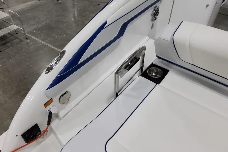 Slide: The Image of 2026 Formula 310 Bowrider I/O interior with sleek seating and cup holder. - 17