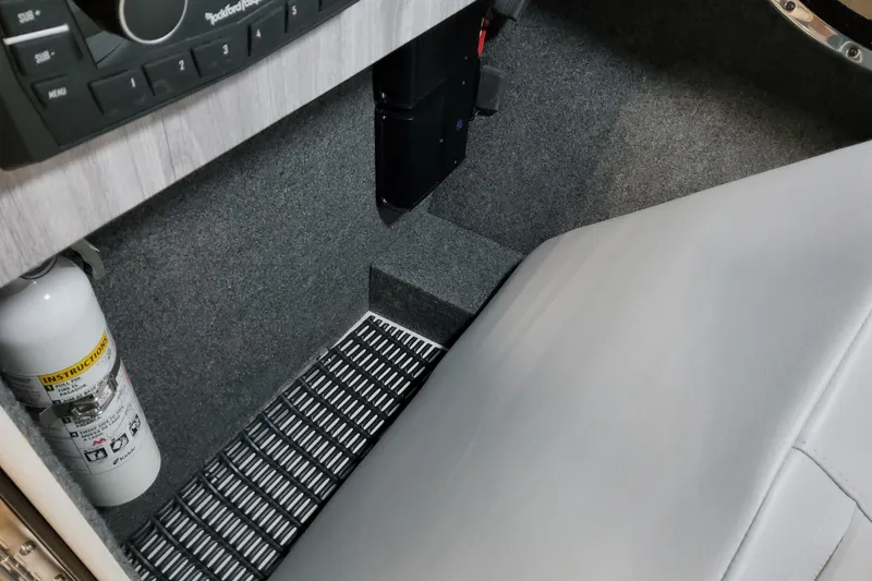 Slide: The Image of Interior of 2026 Formula 310 Bowrider I/O with fire extinguisher and control panel. - 36