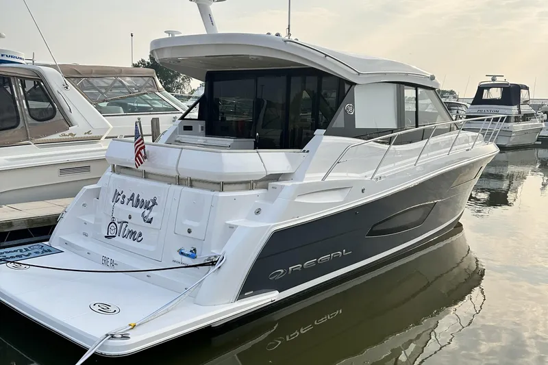 Slide: The Image of Manufacturer Provided Image: 2022 Regal 38 Grande Coupe bow seating area with water view. - 1