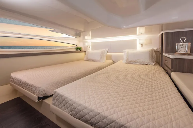 Slide: The Image of Outdoor kitchen area on 2022 Regal 38 Grande Coupe yacht, featuring grill and sink. - 25