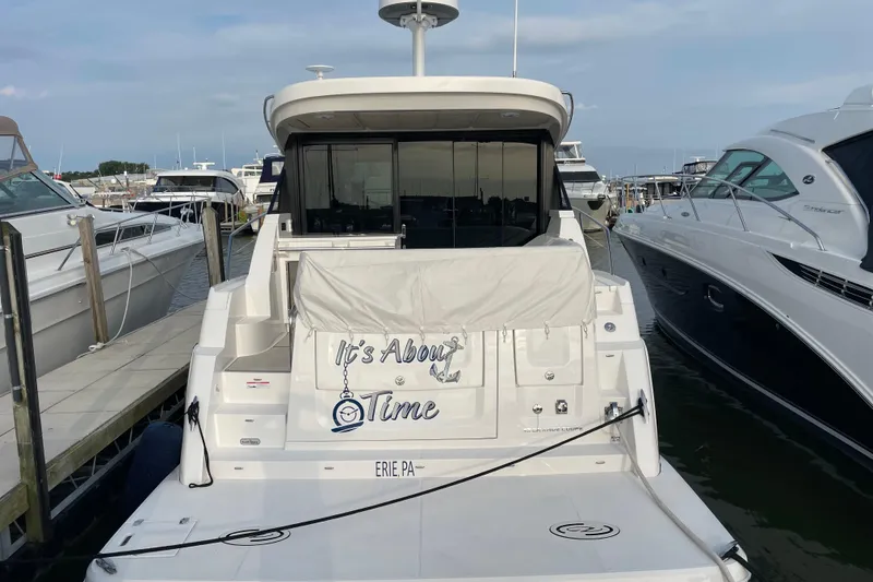 Slide: The Image of Manufacturer Provided Image: 2022 Regal 38 Grande Coupe helm with modern navigation systems and ocean view. - 3