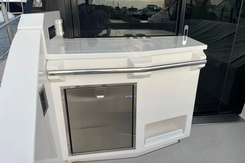 Slide: The Image of Engine room of 2022 Regal 38 Grande Coupe with Volvo Penta engines and equipment. - 33