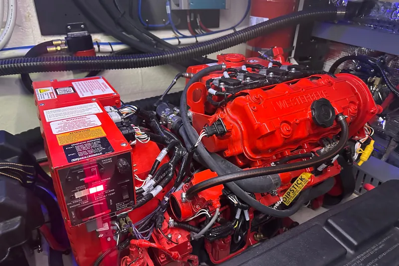 Slide: The Image of 2022 Regal 38 Grande Coupe yacht docked in marina, front view. - 40