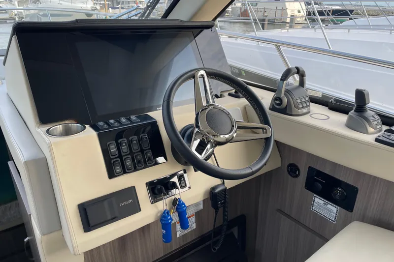 Slide: The Image of Manufacturer Provided Image: Under-seat storage compartments in 2022 Regal 38 Grande Coupe yacht. - 9