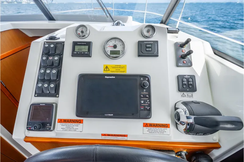 Slide: The Image of Control panel of a 2017 Beneteau Swift Trawler 30 with navigation equipment. - 14