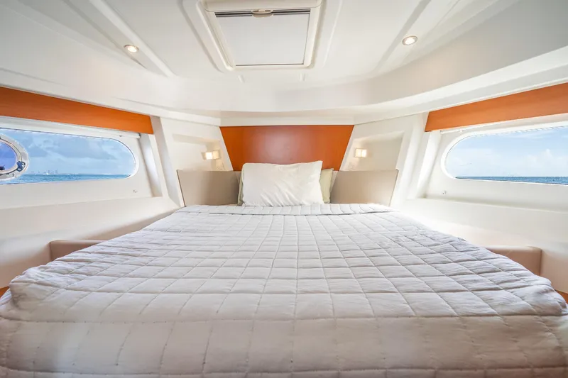 Slide: The Image of Luxurious cabin interior of 2017 Beneteau Swift Trawler 30 with ocean view windows. - 8