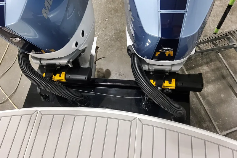 Slide: The Image of 2026 Formula 310 Bowrider OB with dual outboard motors, top view. - 19