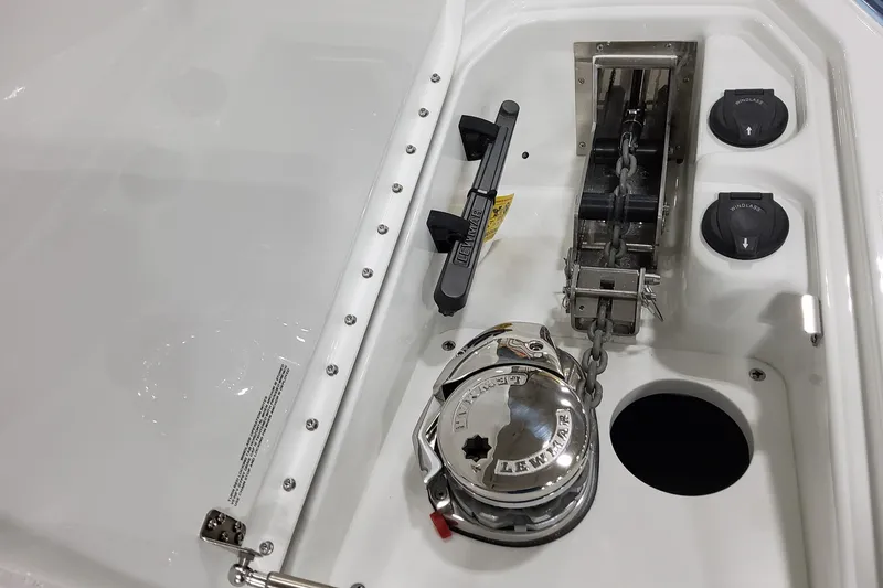 Slide: The Image of 2026 Formula 310 Bowrider OB anchor system with Lewmar windlass and chain mechanism. - 30