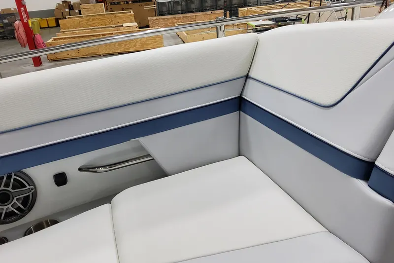 Slide: The Image of 2026 Formula 310 Bowrider OB interior with white and blue seating detail. - 32