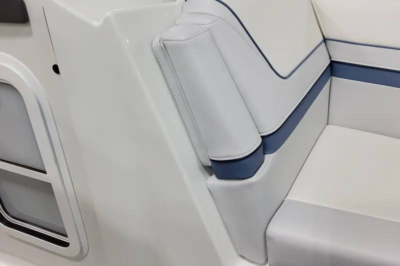 Slide: The Image of 2026 Formula 310 Bowrider OB interior seating with white and blue upholstery. - 39