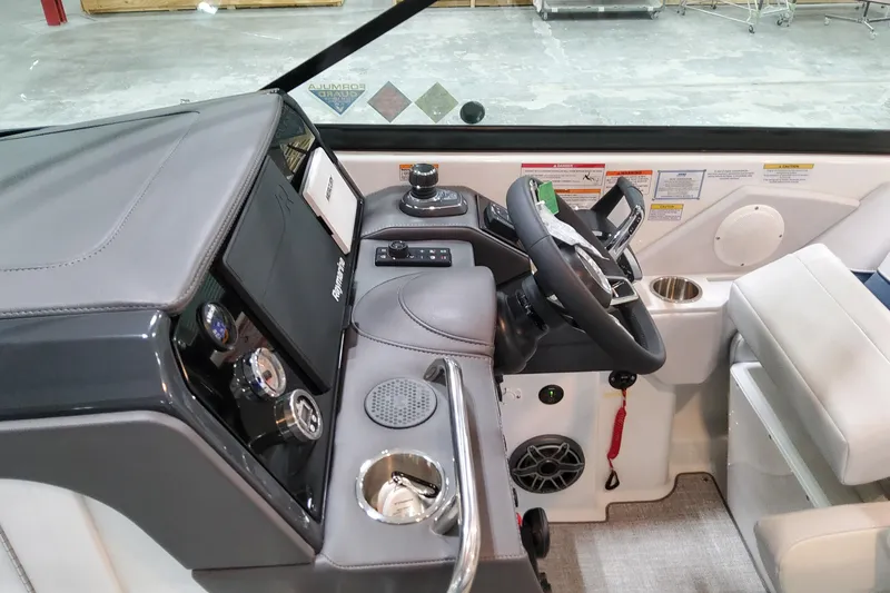 Slide: The Image of 2026 Formula 310 Bowrider OB cockpit with modern controls and steering wheel. - 49