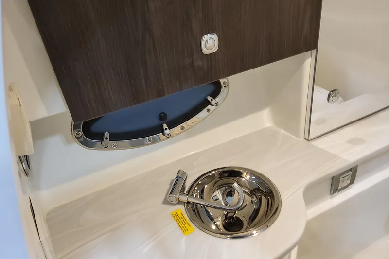 Slide: The Image of 2026 Formula 310 Bowrider OB interior with sleek sink and modern cabinetry. - 57