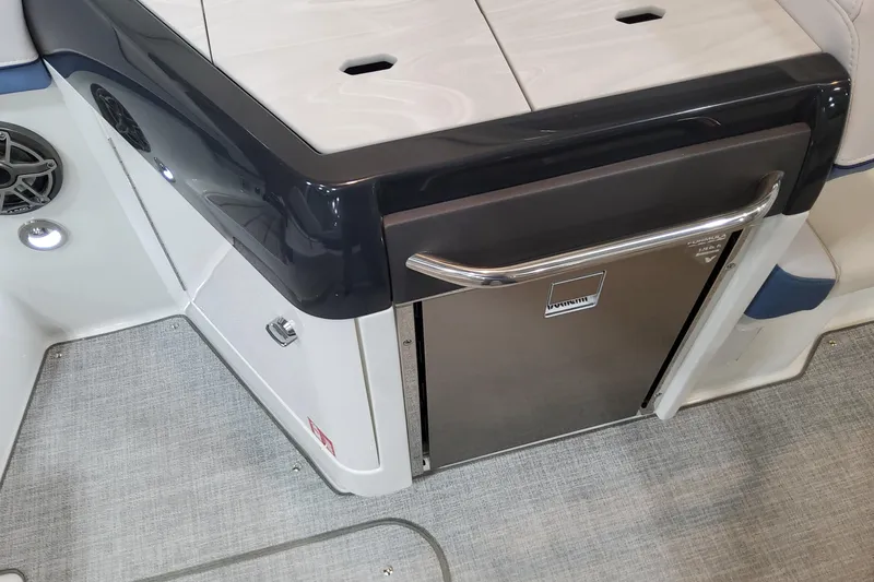 Slide: The Image of 2026 Formula 310 Bowrider OB interior with stainless steel refrigerator and modern design. - 67