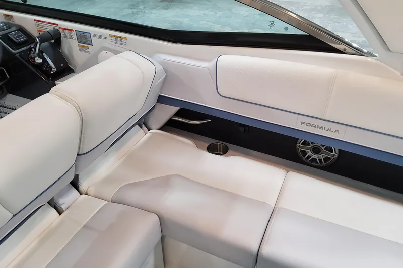 Slide: The Image of 2026 Formula 310 Bowrider OB interior with white seating and modern design. - 73