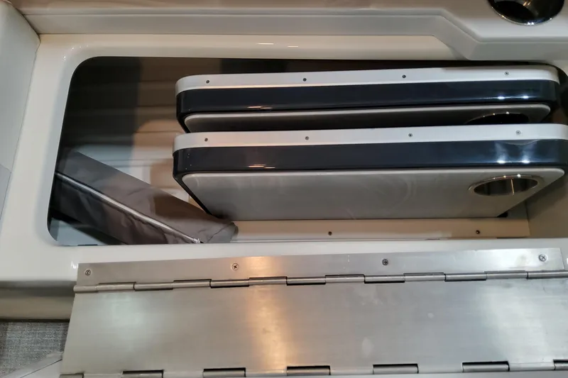 Slide: The Image of Storage compartment in 2026 Formula 310 Bowrider OB boat, featuring sleek design and functionality. - 79