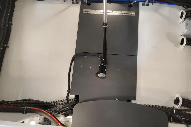 Slide: The Image of Interior view of 2026 Formula 310 Bowrider OB boat, showcasing mechanical components. - 82