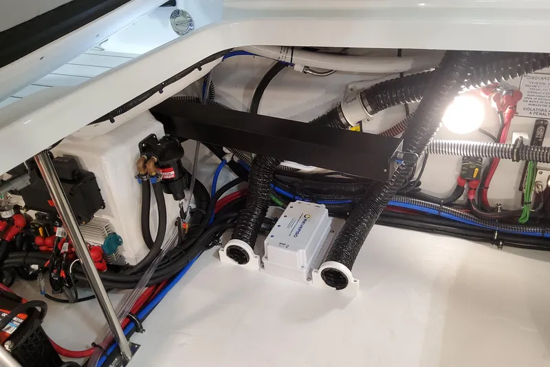 Slide: The Image of Engine compartment of 2026 Formula 310 Bowrider OB, showcasing wiring and components. - 87