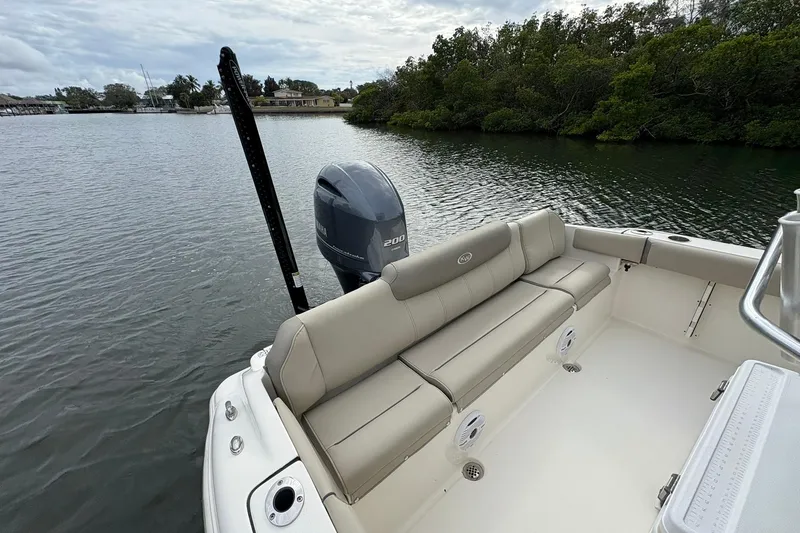 Slide: The Image of 2023 Key West 219 FS boat with Yamaha engine on calm water. - 14