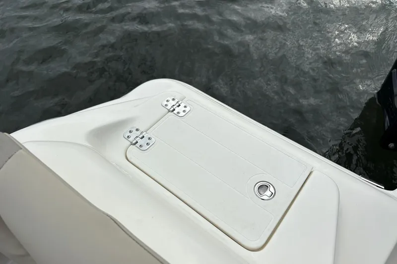 Slide: The Image of 2023 Key West 219 FS boat deck detail with water in the background. - 22
