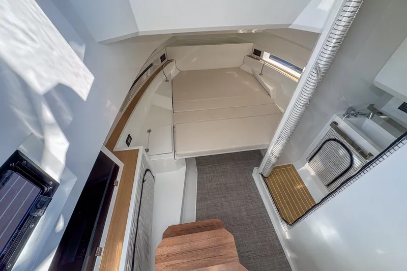 Slide: The Image of Interior of 2026 De Antonio Yachts D32, featuring modern design and compact amenities. - 26