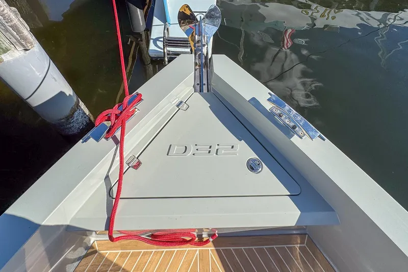 Slide: The Image of Bow of 2026 De Antonio Yachts D32 with anchor and red rope. - 35