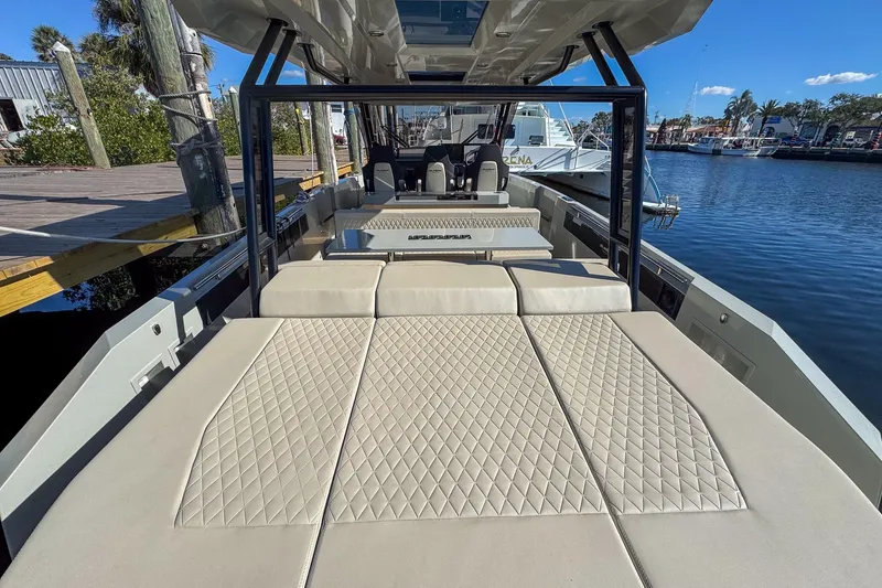 Slide: The Image of Luxurious 2026 De Antonio Yachts D32 with spacious sunbathing area and elegant design. - 9