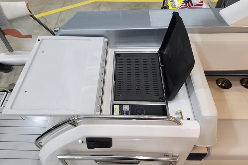 Slide: The Image of 2026 Formula 400 Super Sport Crossover boat grill and prep station. - 15