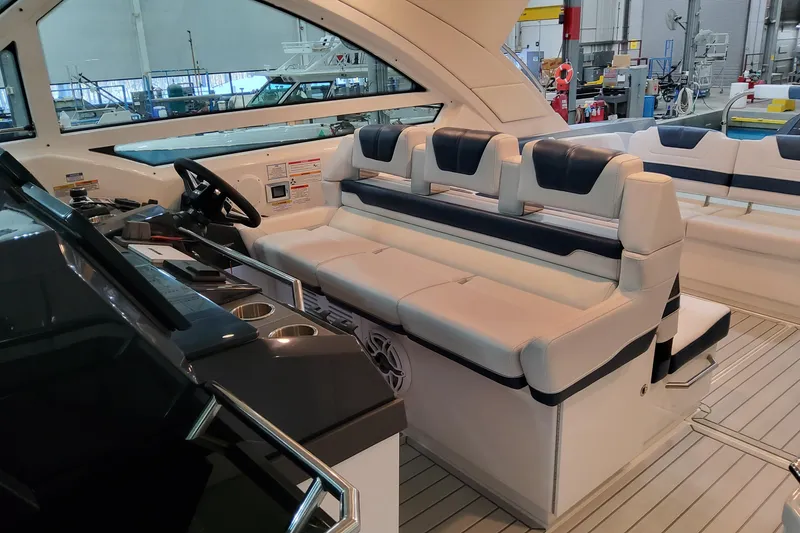 Slide: The Image of 2026 Formula 400 Super Sport Crossover interior with luxurious seating and modern helm. - 19