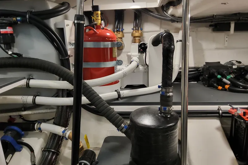 Slide: The Image of Engine room of 2026 Formula 400 Super Sport Crossover with hoses and equipment. - 25