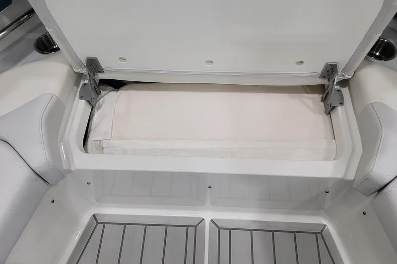 Slide: The Image of Open storage compartment in 2026 Formula 400 Super Sport Crossover boat interior. - 34
