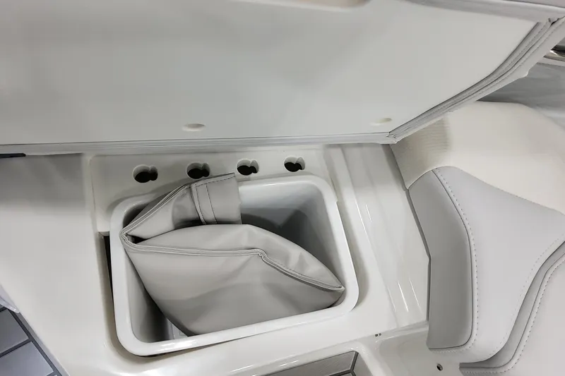 Slide: The Image of 2026 Formula 400 Super Sport Crossover interior storage compartment with cushion. - 35