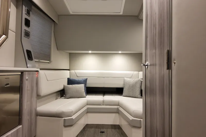 Slide: The Image of Luxurious interior of 2026 Formula 400 Super Sport Crossover with modern seating and cushions. - 39