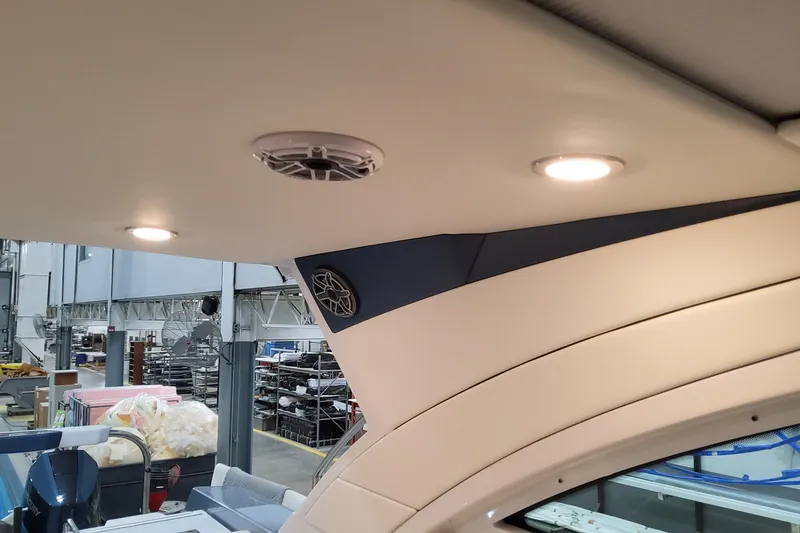 Slide: The Image of Interior view of 2026 Formula 400 Super Sport Crossover boat with ceiling lights and speaker. - 53