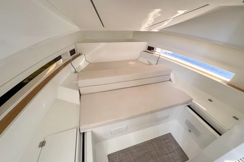 Slide: The Image of Interior of 2026 De Antonio Yachts D32, featuring a modern, minimalist cabin design. - 28