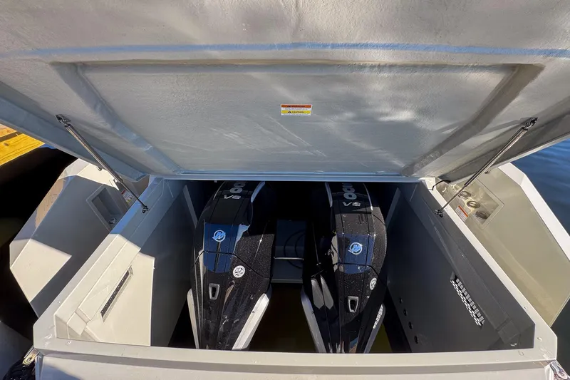 Slide: The Image of 2026 De Antonio Yachts D32 engine compartment with dual V8 outboard motors. - 10