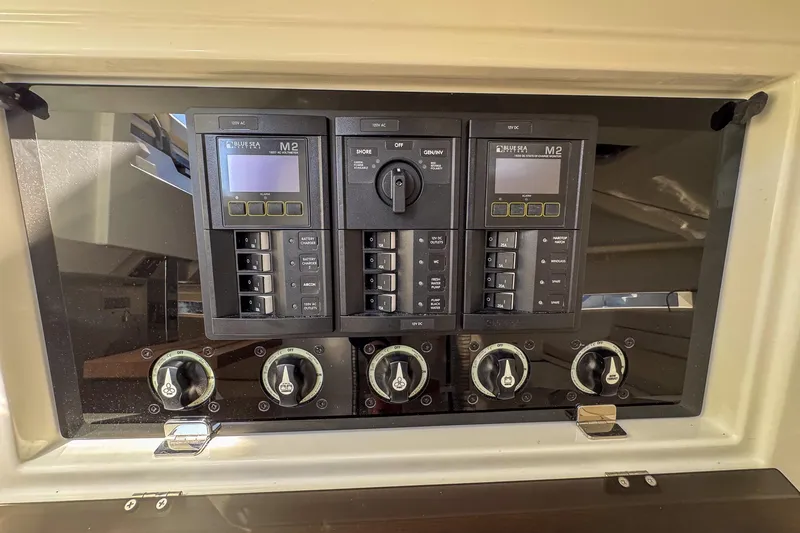 Slide: The Image of Control panel of 2026 De Antonio Yachts D32, featuring Blue Sea Systems M2 displays. - 31