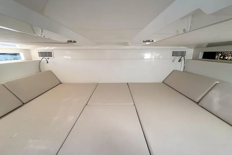 Slide: The Image of Interior cabin of 2026 De Antonio Yachts D32, featuring beige seating and modern design. - 33