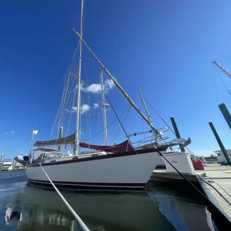 The Image of 1981 Pearson 36 sailboat docked at marina. - 0