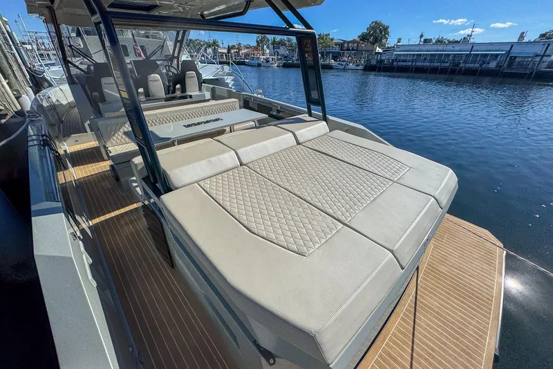 Slide: The Image of Luxurious 2026 De Antonio Yachts D32 with spacious sunbathing area, docked at marina. - 8