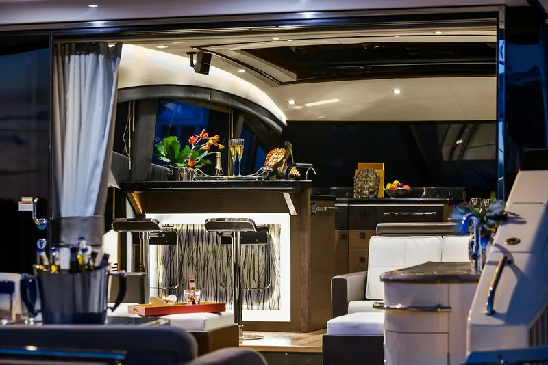 Slide: The Image of Manufacturer Provided Image: Luxurious interior of 2016 Sea Ray L650 yacht with modern bar and seating area. - 3