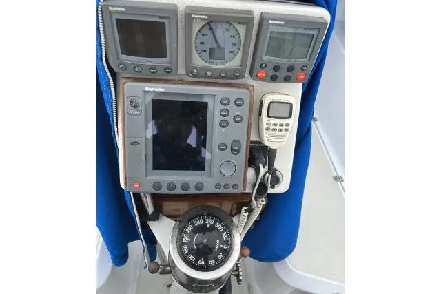 Slide: The Image of Cockpit navigation instruments on a 1983 Ericson 381 sailboat. - 19