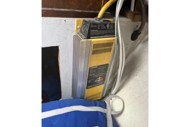 Slide: The Image of Yellow battery charger installed on Ericson 381 sailboat, model year 1983. - 37