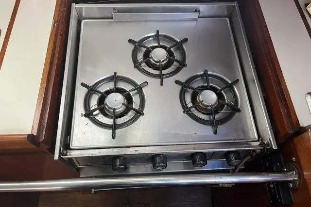 Slide: The Image of Three-burner stove on 1983 Ericson 381 sailboat galley. - 8