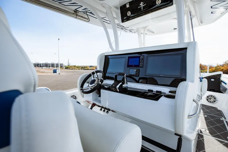 Slide: The Image of Interior of 2026 Statement 350 Open boat with modern dashboard and steering wheel. - 19