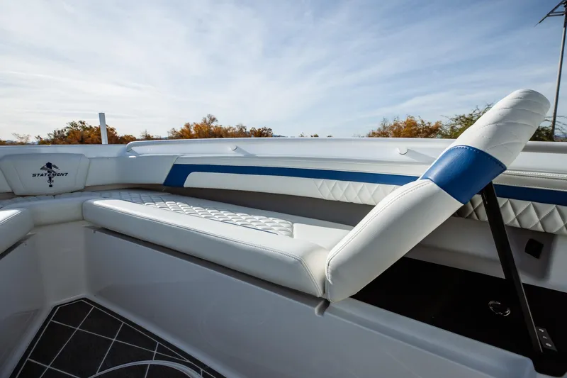 Slide: The Image of 2026 Statement 350 Open boat interior with white and blue seating, showcasing luxury design. - 23